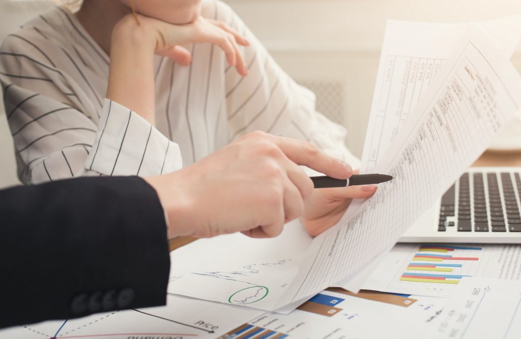 Business colleagues working with documents